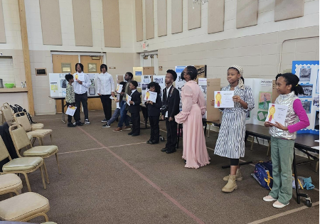 Kids presenting at a social science fair